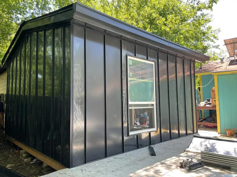 Black standing seam metal wall panels for Metal Roof Installation in Cypress